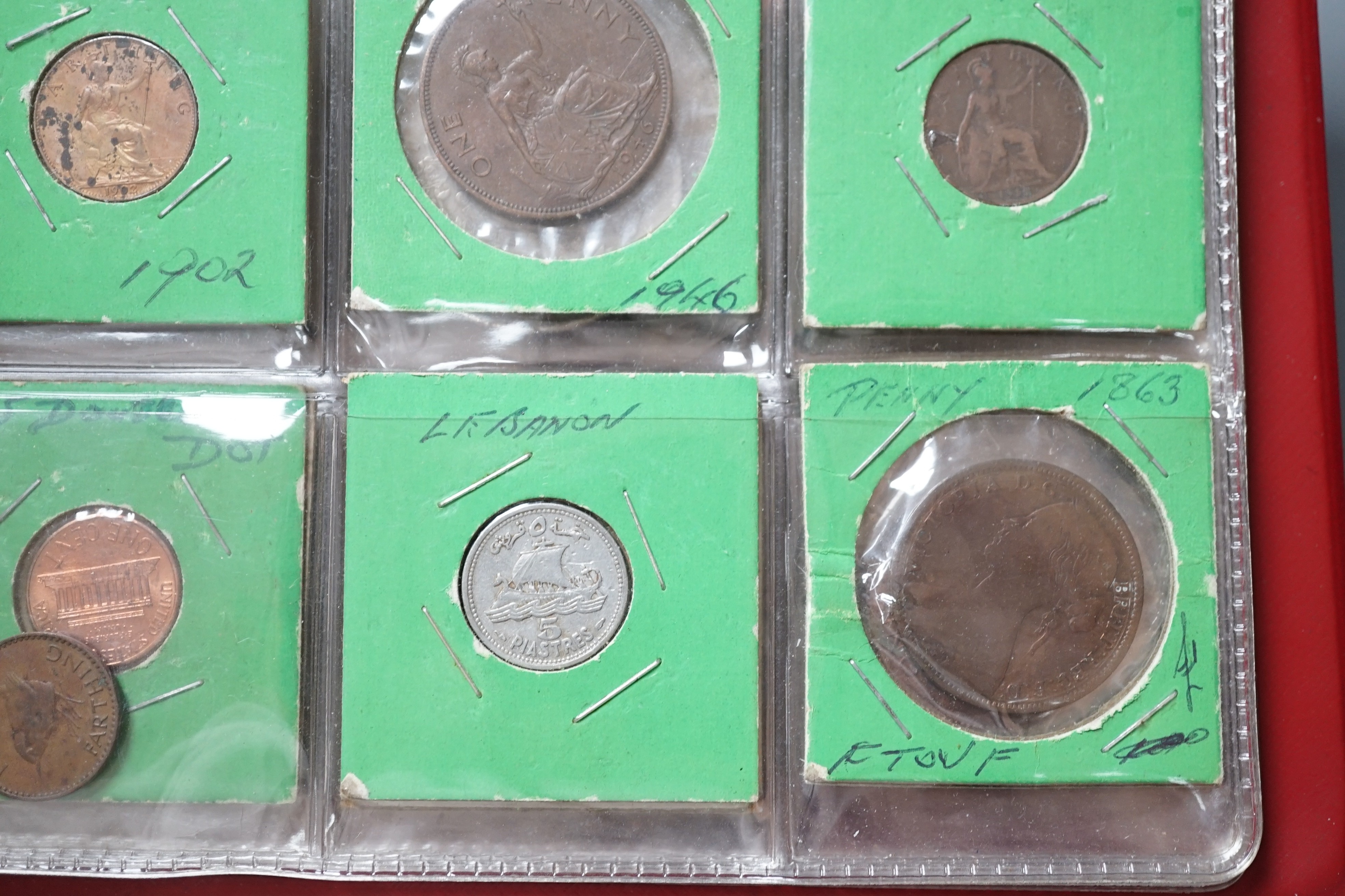 Coins in an album, including reproductions